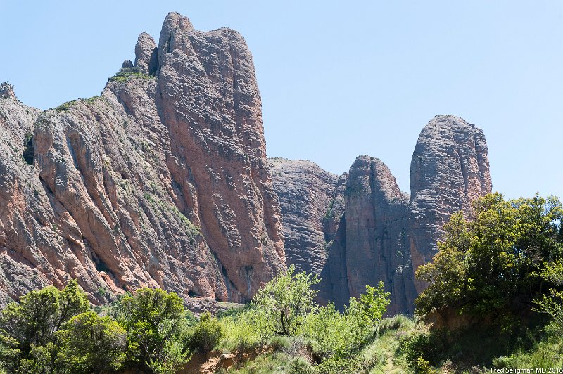 20160601_141435 D4S.jpg - Mallos de Riglos are a set of huge red rock formations that rise up as pillars up to 1000 feet in height.  Its a popular rock climbing place.  Located near Riglos about 25 miles from city of Huesca